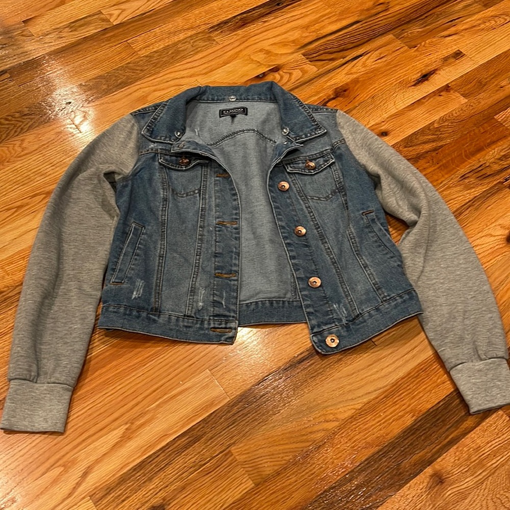 Jean jacket with soft gray sleeves